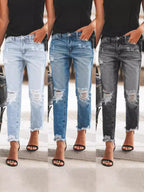 Women's Ripped Denim Jeans with Casual Cut and Frayed Hem Fashion Glam