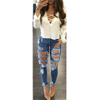 Ladies extreme ripped high-waist skinny jeans with raw fringe waistband Fashion Glam