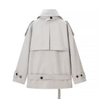 Women's short trench-style jacket with high standing collar, double-breasted front and waist belt Fashion Glam