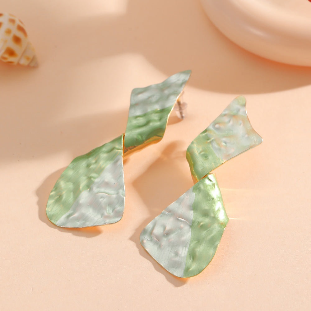Ladies earrings in modern disc design Fashion Glam