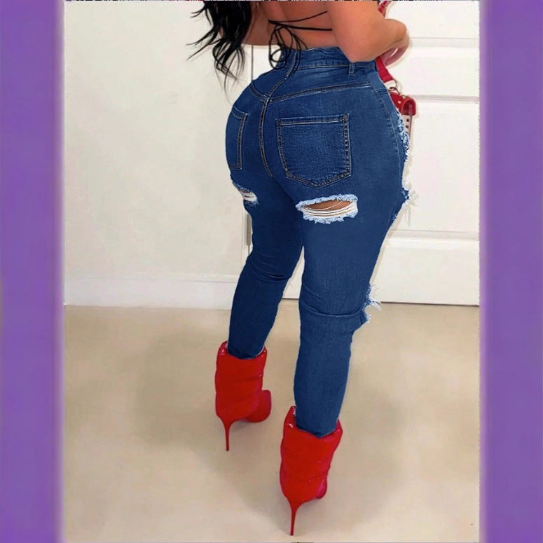 Ladies high-waisted skinny jeans with XXL knee cutouts, heavily distressed used look and sculpting cut Fashion Glam