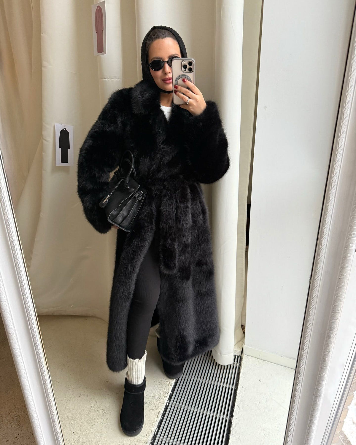Women's elegant long pile faux fur coat with hood and tailored silhouette Fashion Glam