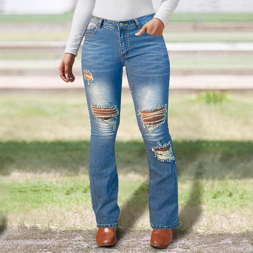 Women's waist-accentuated stretch denim jeans with flared leg and prominent knee rips Fashion Glam