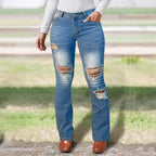 Women's waist-accentuated stretch denim jeans with flared leg and prominent knee rips Fashion Glam