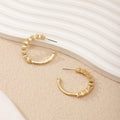 Ladies hoop earrings with intricate structures Fashion Glam