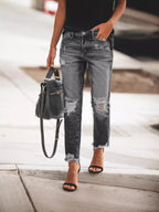 Women's Ripped Denim Jeans with Casual Cut and Frayed Hem Fashion Glam