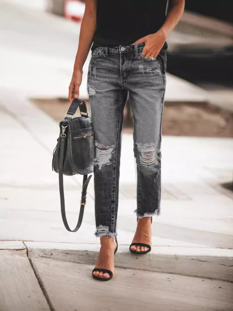 Women's Ripped Denim Jeans with Casual Cut and Frayed Hem Fashion Glam