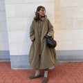 Women's oversized padded cocoon coat with concealed button placket and dropped shoulders Fashion Glam