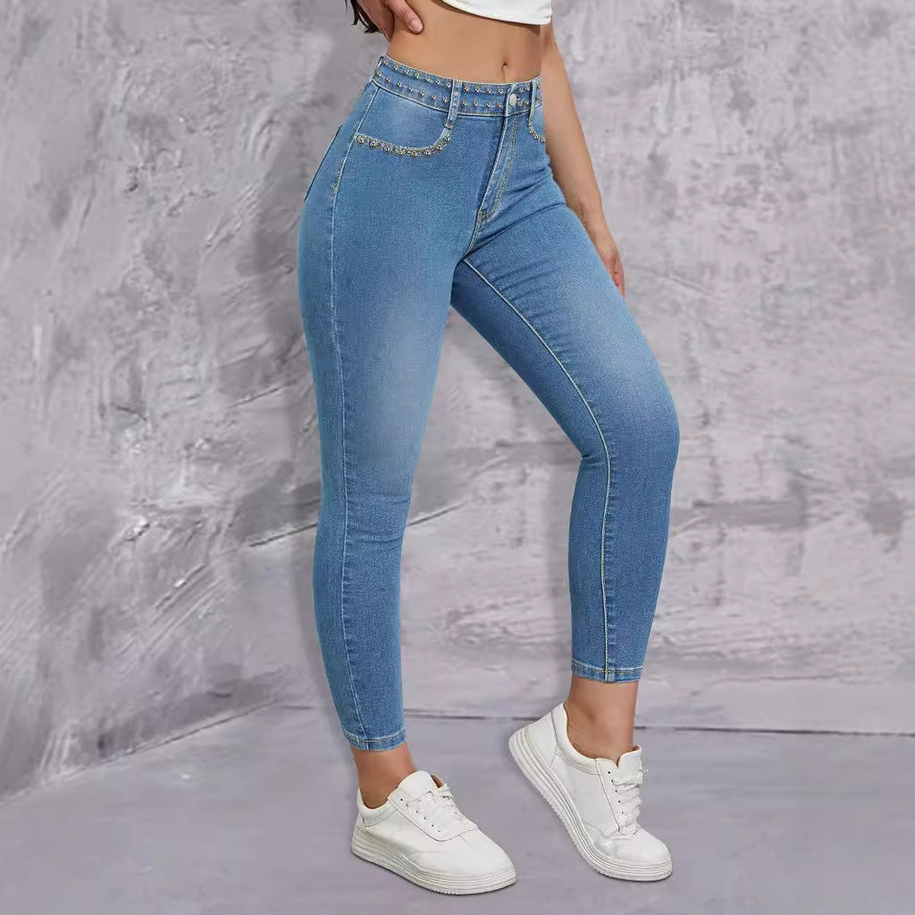 Ladies high-waisted skinny jeans with rhinestone embellishments and ankle-length cut Fashion Glam