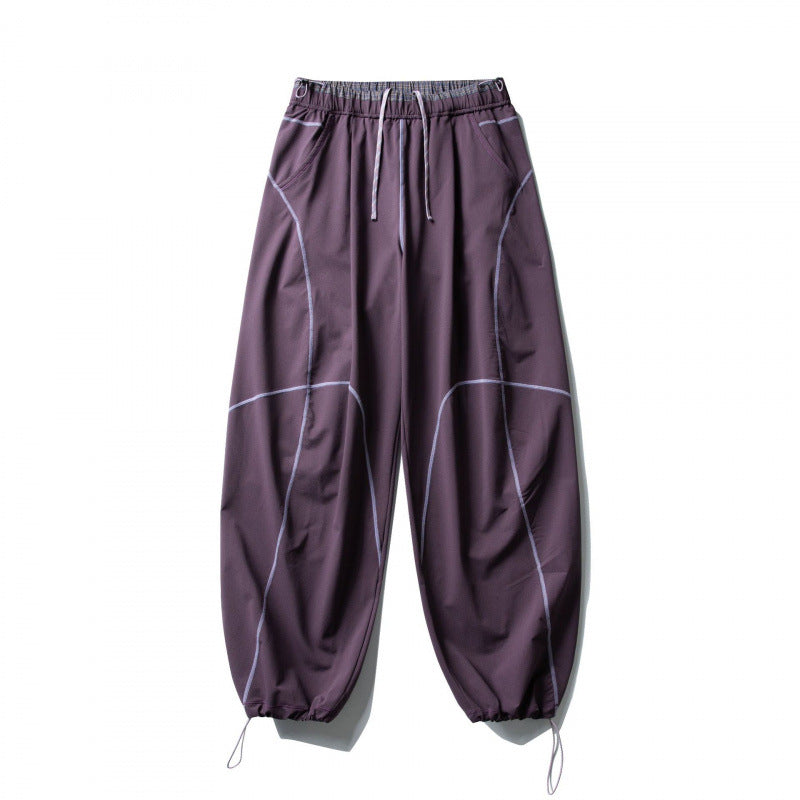 Unisex locker cut tech jogging pants with elastic waistband, distinctive flatlock seams and drawstring Fashion Glam