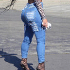 Women High-Waisted Skinny Jeans with Large Frayed Rips Fashion Glam