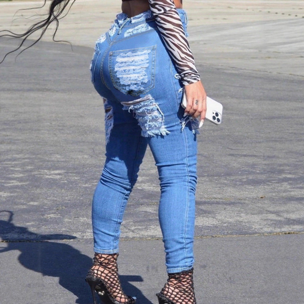 Women High-Waisted Skinny Jeans with Large Frayed Rips Fashion Glam