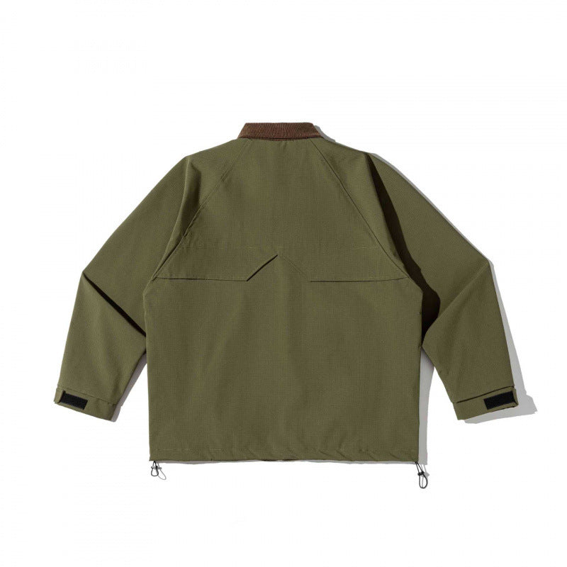 Unisex boxy overshirt jacket in utility style with cord collar, flap pockets and drawstring hem Fashion Glam