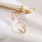 Ladies bracelet with elaborate infinity symbol and sparkling zirconia Fashion Glam