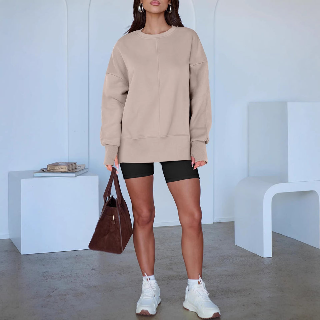 Women's Oversize Sweatshirt with Center Seam, Extended Hem, and Ribbed Cuffs Fashion Glam