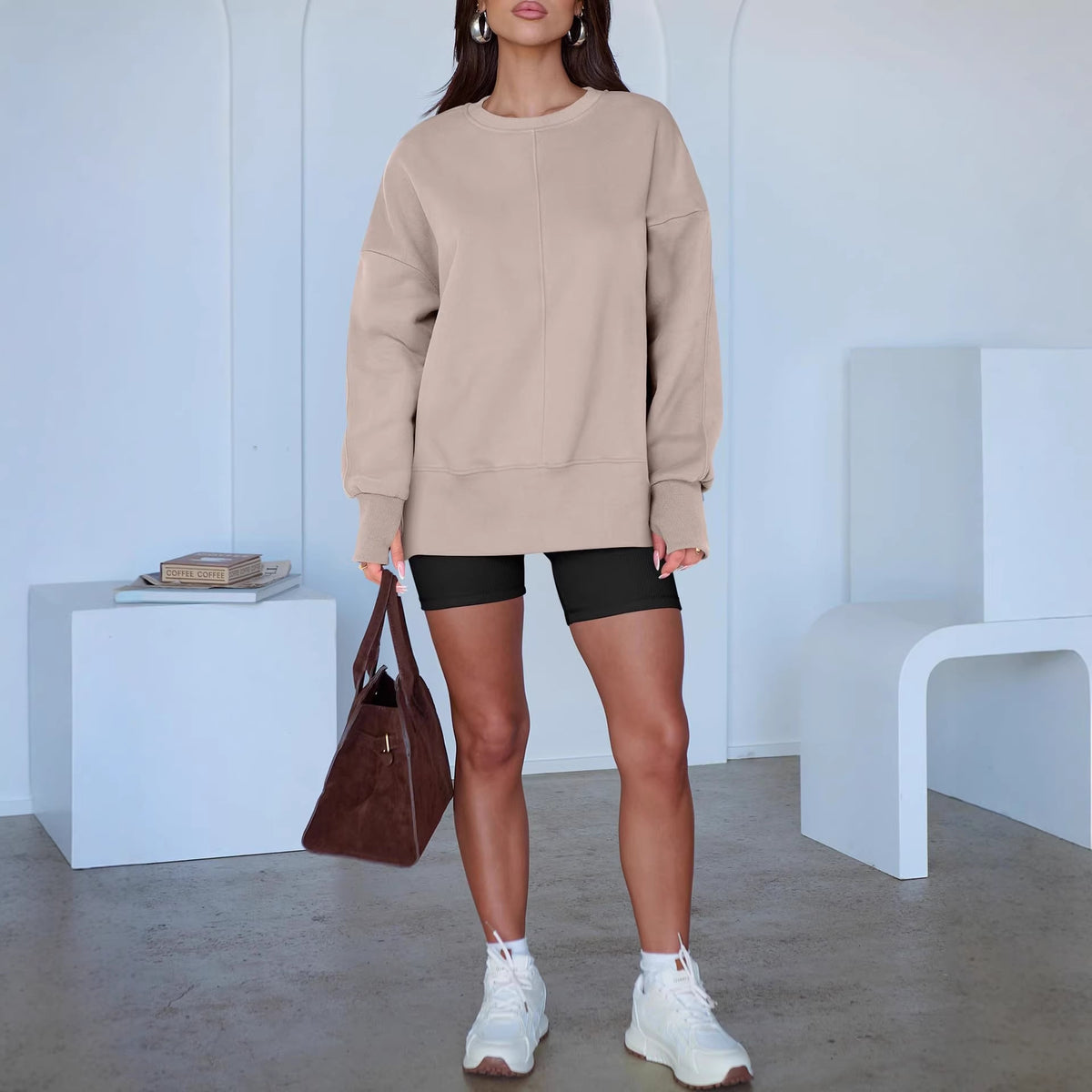 Women's Oversize Sweatshirt with Center Seam, Extended Hem, and Ribbed Cuffs Fashion Glam