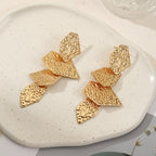 Women's elegant earrings with rustic, folded design Fashion Glam