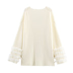Ladies fine knit mini dress with deep V-neckline and layered faux fur sleeves Fashion Glam