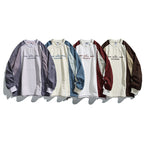 Unisex Loose Fit Colorblock Long Sleeve Shirt made of Lightweight Nylon Blend with Raglan Sleeves and Chest Print Fashion Glam