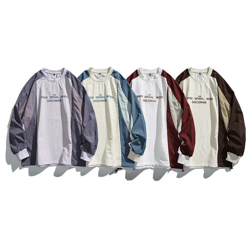 Unisex Loose Fit Colorblock Long Sleeve Shirt made of Lightweight Nylon Blend with Raglan Sleeves and Chest Print Fashion Glam