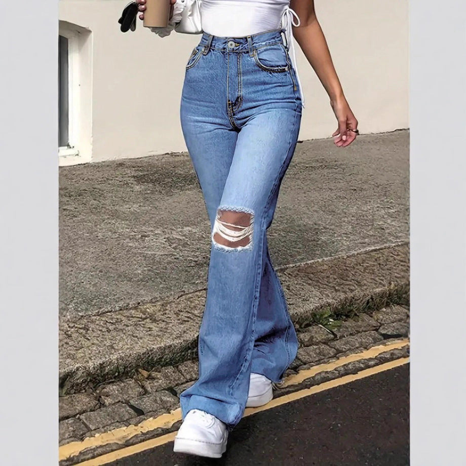 Ladies High-Waisted Flared Jeans in Retro Cut with Knee Rip and Extended Hem Fashion Glam
