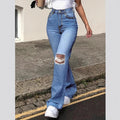 Ladies High-Waisted Flared Jeans in Retro Cut with Knee Rip and Extended Hem Fashion Glam