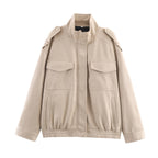 Women's short jacket in utility bomber style with flap pockets, shoulder tabs, and elastic hem Fashion Glam