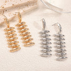 Ladies Hanging Earrings in Modern Spiral Design Fashion Glam