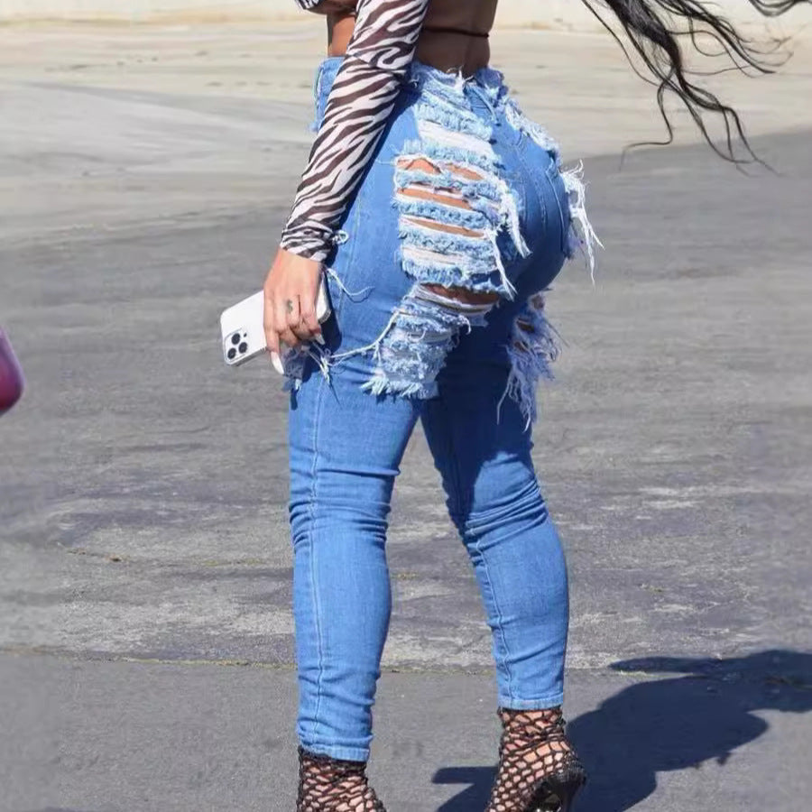 Women's high-waisted skinny jeans with intense fringe and slit details Fashion Glam