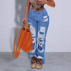 Women heavily distressed flared jeans with wide legs and ripped inserts Fashion Glam