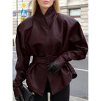 Women's leather look jacket with fitted belt and high stand-up collar Fashion Glam