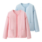 Women's Quilted Transition Jacket with Round Neckline, Light Padding and Patch Pockets Fashion Glam