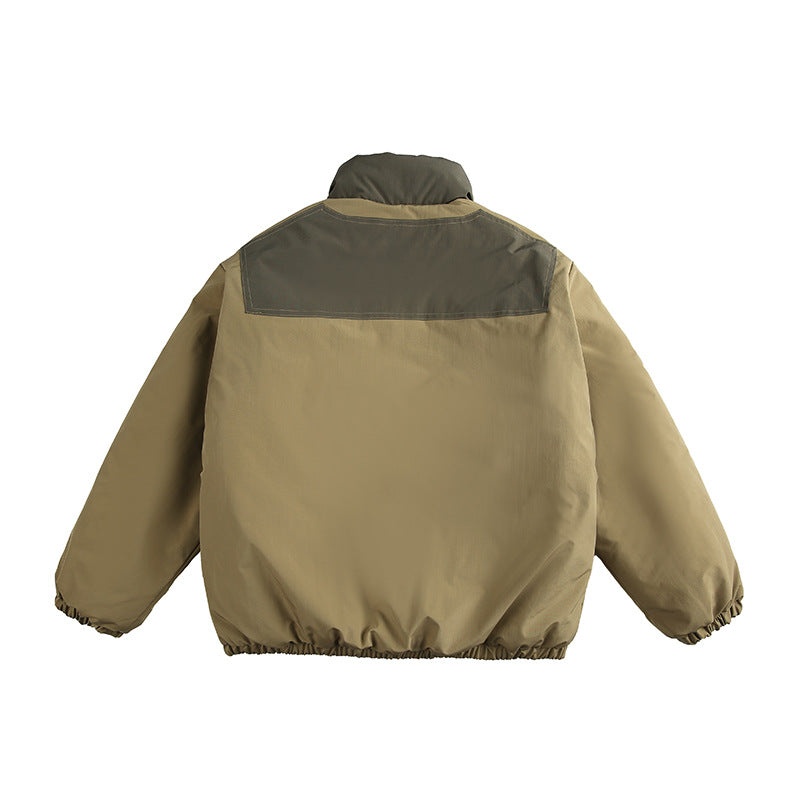 Unisex Boxy padded stand-up collar jacket with contrast panels, vertical chest zippers, and large flap pockets Fashion Glam