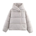 Women short cut oversized quilted jacket with high wrap collar and padded lining Fashion Glam