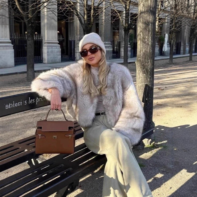 Women's short jacket made of luxurious high-pile faux fur with a boxy silhouette and voluminous sleeves Fashion Glam