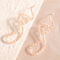 Ladies earrings in elegant wave pattern Fashion Glam