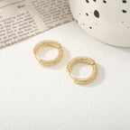 Women's hoop earrings with modern, textured design Fashion Glam