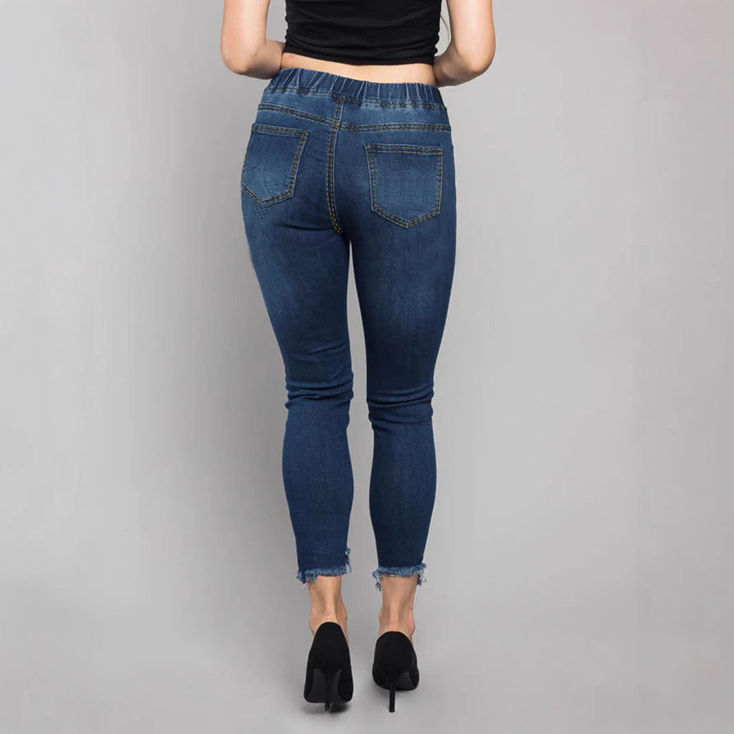 Women High-Waisted Destroyed Jogger Jeans with Elastic Drawstring Waistband and Cropped Frayed Hem Fashion Glam