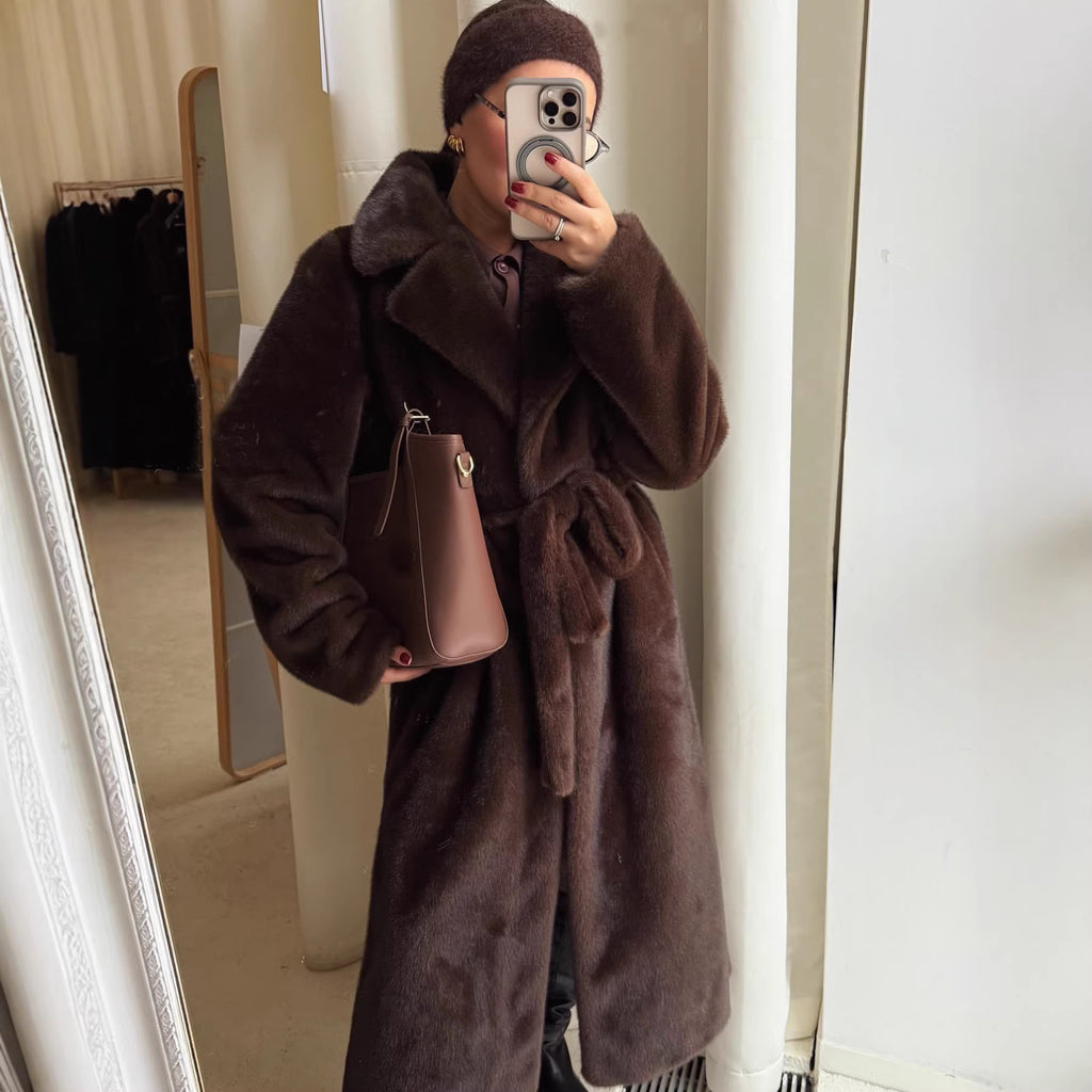 Women's elegant long pile faux fur coat with hood and tailored silhouette Fashion Glam