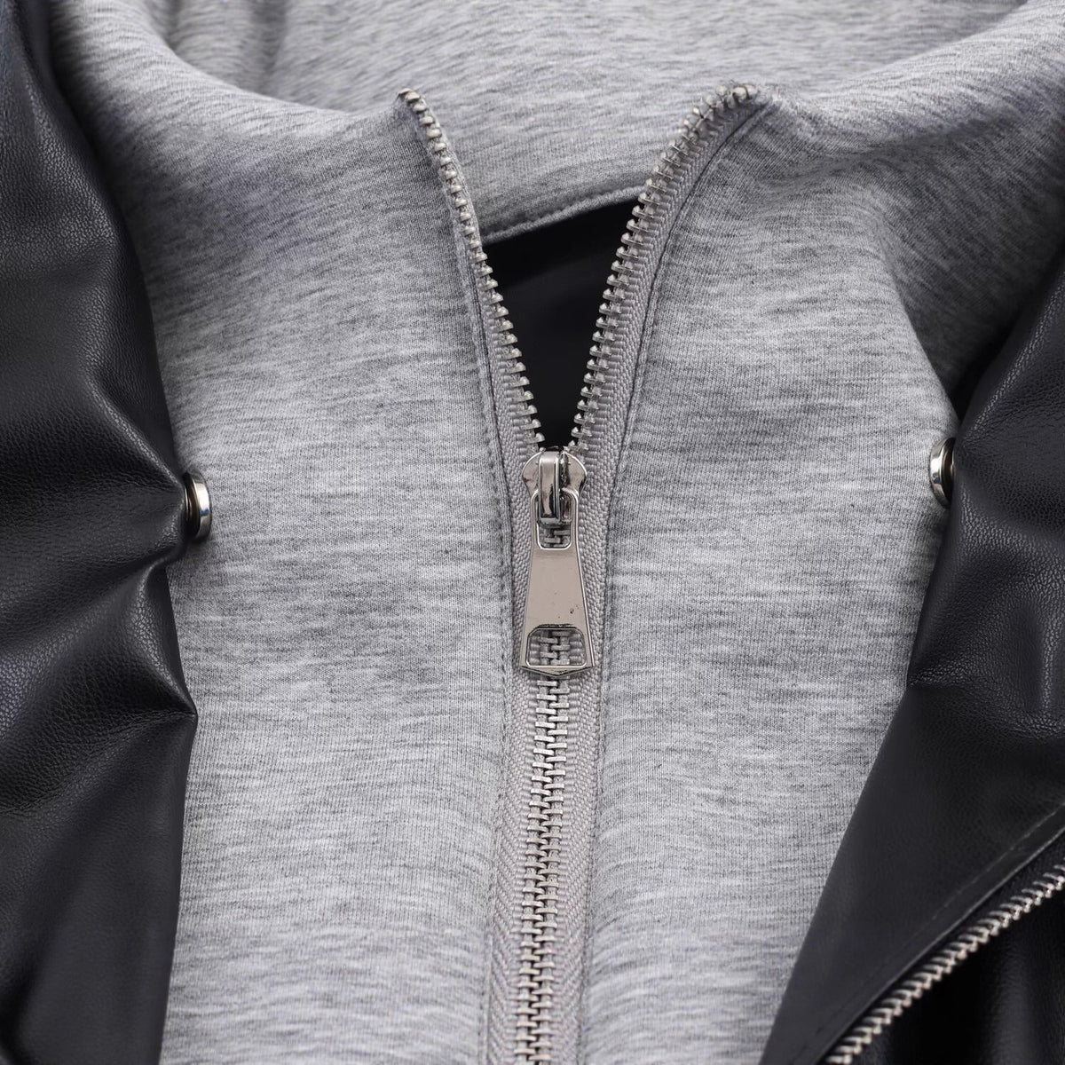 Women's Faux Leather Bomber Jacket with Contrasting Hood in Sweatstyle and Elastic Hem Fashion Glam