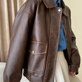 Women's Boxy Faux Leather Pilot Jacket with Flap Pockets and Elastic Hem Fashion Glam