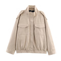 Women's short jacket in utility bomber style with flap pockets, shoulder tabs, and elastic hem Fashion Glam