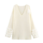 Ladies fine knit mini dress with deep V-neckline and layered faux fur sleeves Fashion Glam