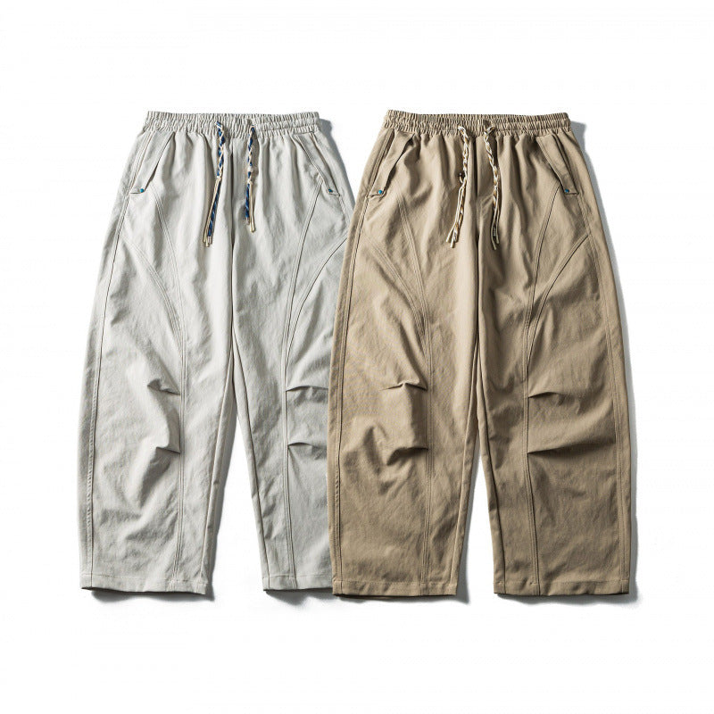 Unisex Wide Cropped Pants with Drawstring, Elastic Waistband and Distinctive Seam Panels Fashion Glam