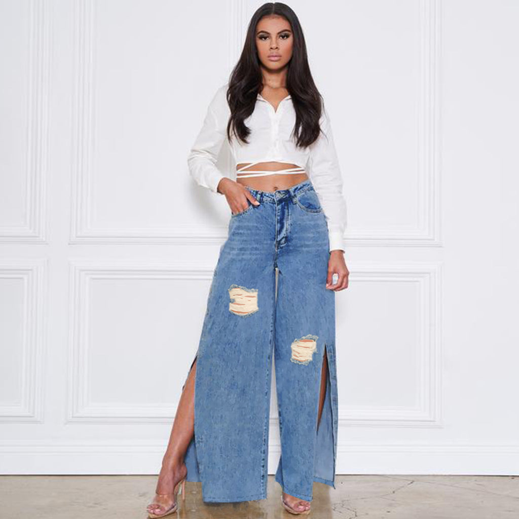 Women's high-cut jeans with wide leg, knee rips, and side leg slits Fashion Glam