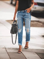 Women's Ripped Denim Jeans with Casual Cut and Frayed Hem Fashion Glam