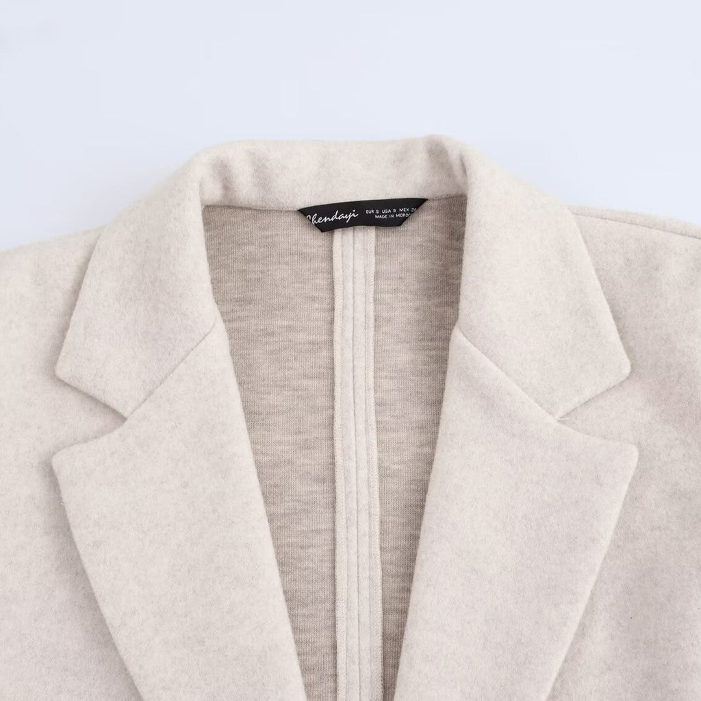 Ladies Purist longline coat with lapel collar, single button closure and soft felt finish Fashion Glam