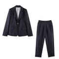 Women's pinstripe long blazer with a slightly oversized fit and decorative single-button closure