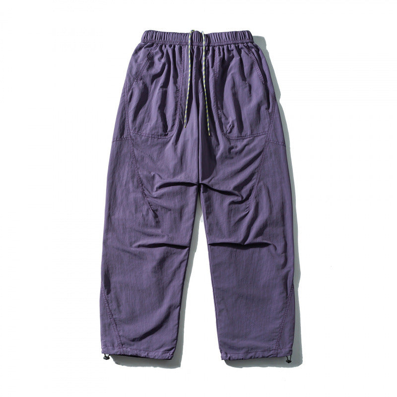 Unisex Loose-fitting outdoor pants with elastic waistband, drawstring, and adjustable leg cuffs Fashion Glam