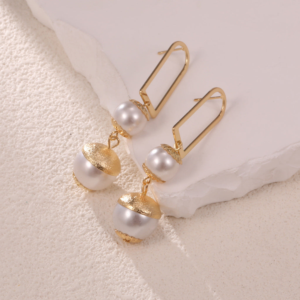 Ladies earrings with elegant pearl design Fashion Glam